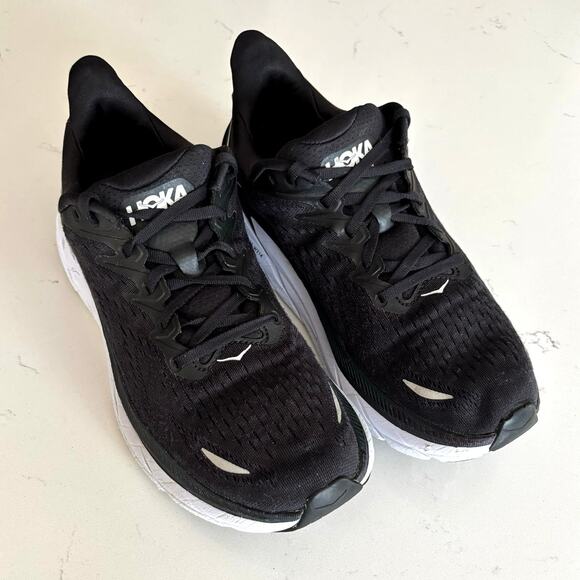 Hoka One One Clifton 8 running shoes sz 11 M blk wht athletic training outdoors main image 9